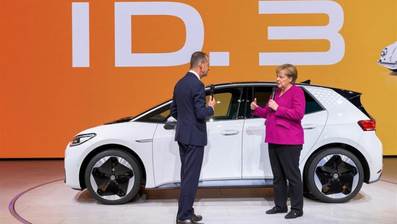ep main german chancellor angela merkel r welcomed by chairman of the board of management of ep main german chancellor angela merkel r welcomed by chairman of the board of management of