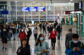 ep travellers and airline crew members are seen wearing surgical masks as a protective measure from