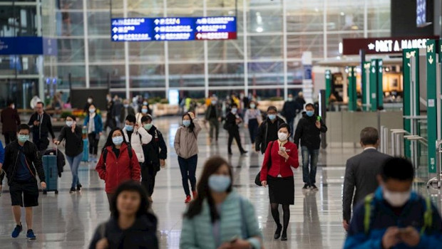 ep travellers and airline crew members are seen wearing surgical masks as a protective measure from