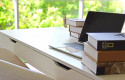 ep archivo - un escritorio con un ordenador portatil y varios libros ep archivo - un escritorio con un ordenador portatil y varios libros