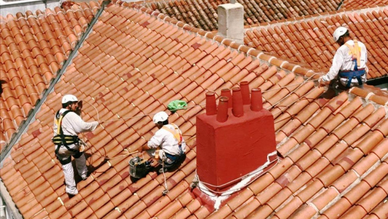 1238571 gijon trabajos en tejado edificio