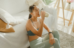 woman drinking a protein shake woman drinking a protein shake