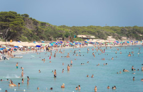 ep archivo   varias personas se banan en la playa de ses salines a 11 de julio de 2023 en ibiza