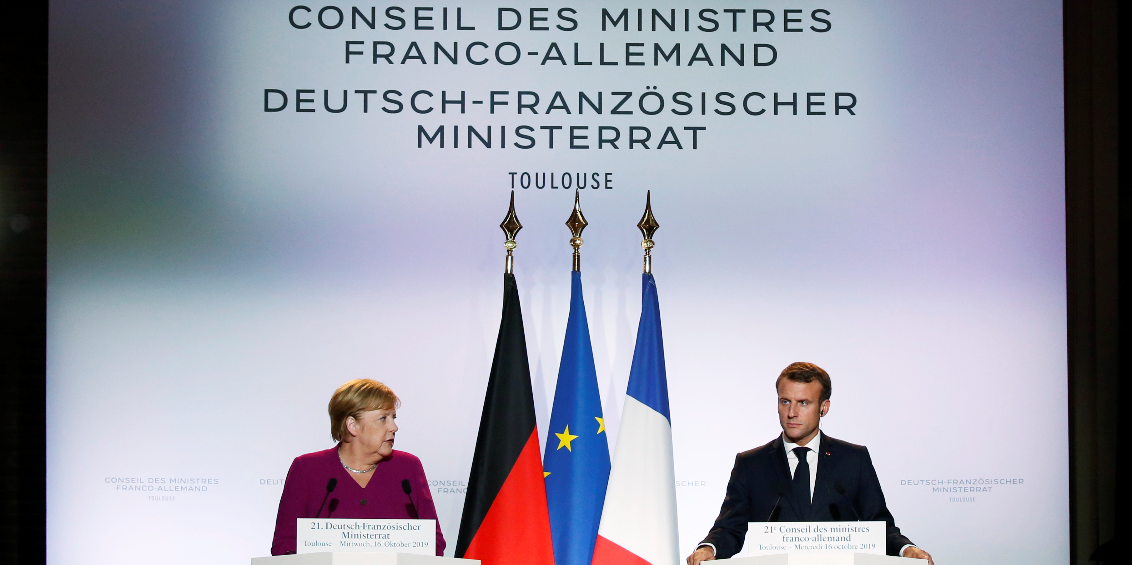 https://img1.s3wfg.com/web/img/images_uploaded/4/0/macron-merkel-toulouse.png