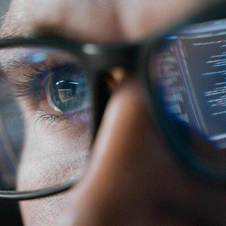 close up portrait of software engineer working on computer 768x768