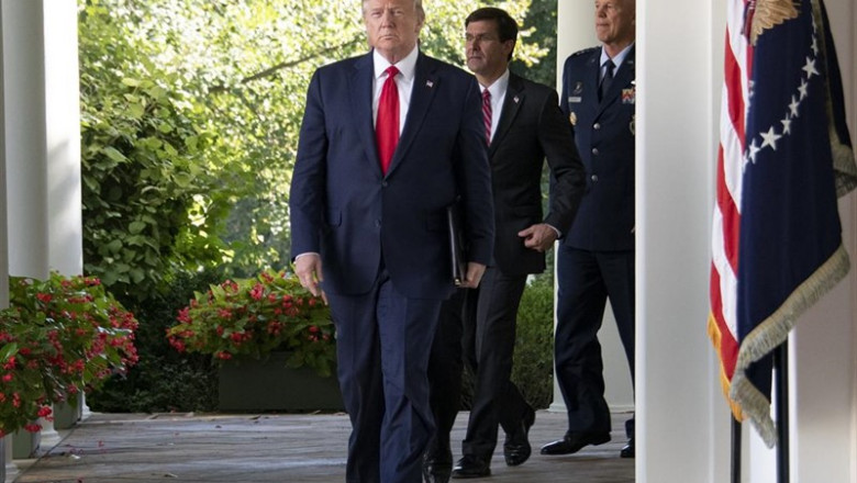 August 29, 2019 - Washington, DC, United States: United States President Donald J. Trump, followed by US Secretary of Defense Dr. Mark T. Esper and General John W. "Jay" Raymond, Commander, Air Force Space Command, walk on the colonnade to announce the es | Ron Sachs ep august 29 2019 - washington dc united states united states president donald j trump followed by