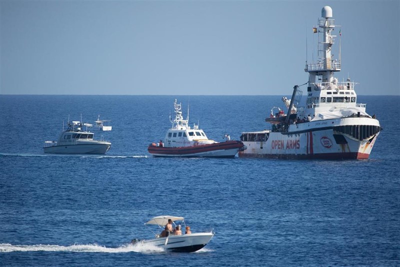 ep handout - 17 august 2019 italy lampedusa ship of the guardia di financza and the italian coast guard dock near rescue ship open arms of the aid organization proactiva open arms shortly beforepotentially dangerous escalation on board the spanish