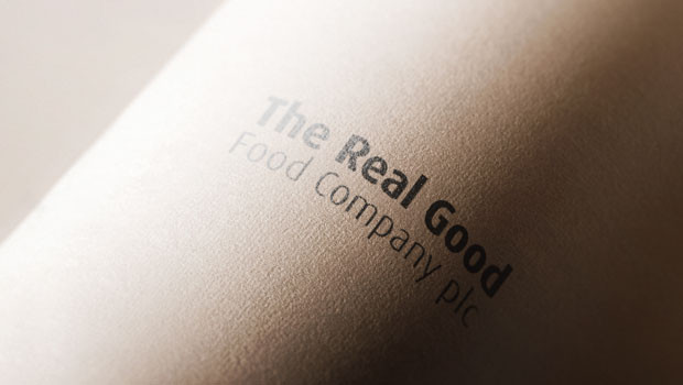 dl the real good food company aim manufacturing decoration foods supplier logo