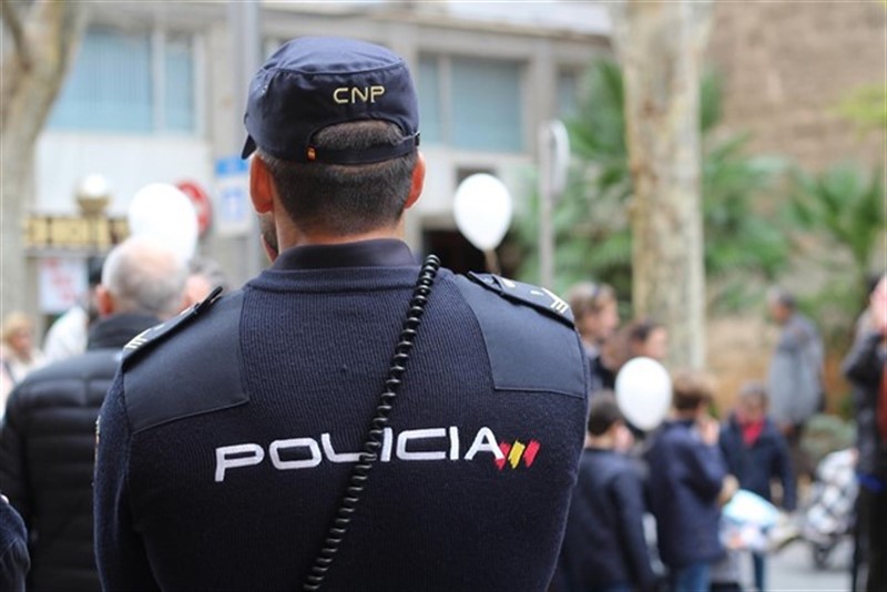 ep policia nacionalespaldas