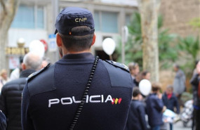ep policia nacionalespaldas