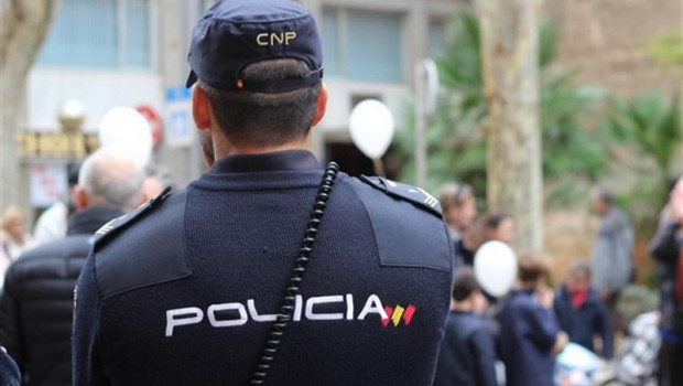 ep policia nacionalespaldas