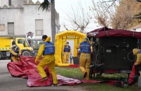 ep varias personas de la ume desinfectan vehiculos durante la presentacion de los medios de la ume