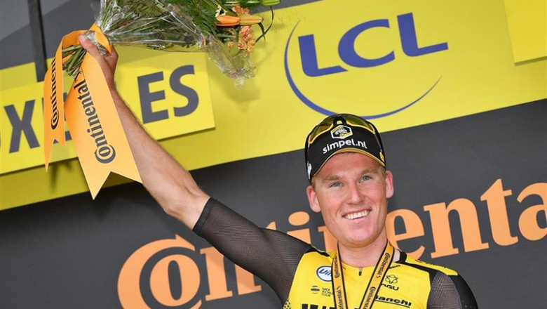 ep 06 july 2019 belgium brussels dutch cyclist mike teunissen r of team jumbo-visma celebrates on the podium after winning the first stage of the 106th edition of the tourfrance cycling race 1945km in brussels photo david stockmanbelgadpa