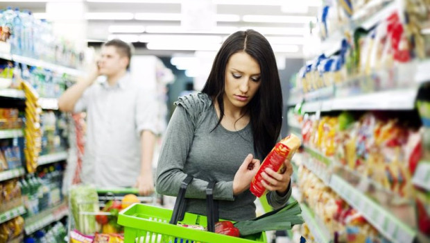 ep young couple shopping at supermarket
