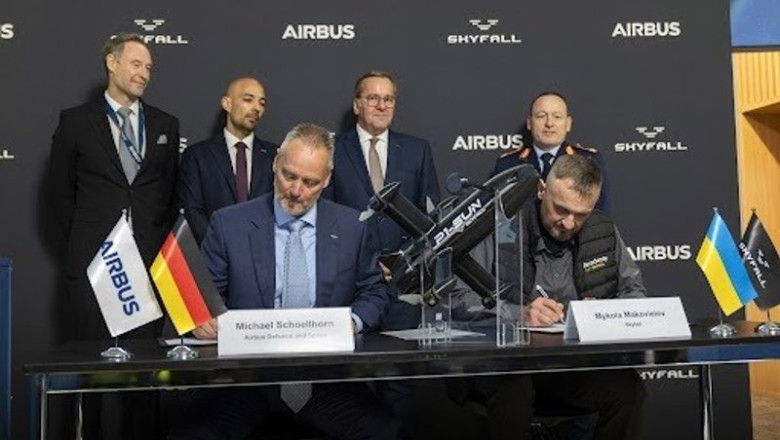 ep michael schoellhorn ceo of airbus defence and space and mykola makovieiev ceo of skyfall sign the