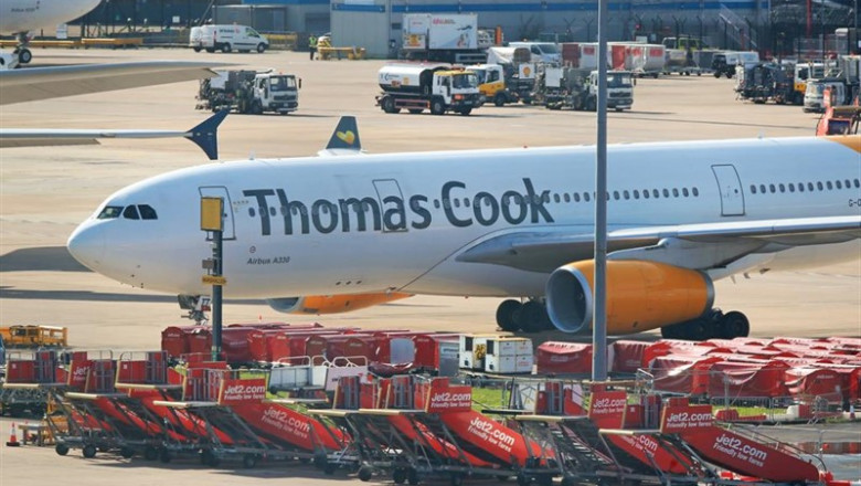 23 September 2019, England, Manchester: An Airbus A330 from the airline Condor with the design of the tourism company Thomas Cook stands on the tarmac at Manchester Airport. Thomas Cook, one of Britain's biggest travel firms, filed for liquidation early | Peter Byrne/PA Wire/dpa ep 23 september 2019 england manchester an airbus a330 from the airline condor with the design of