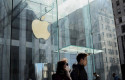 ep march 14 2020 - new york new york united states a couple wearing mask strolling by the apple