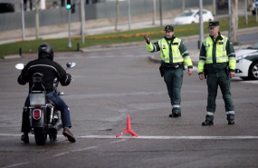 ep archivo   dos guardias civiles de trafico paran a una moto