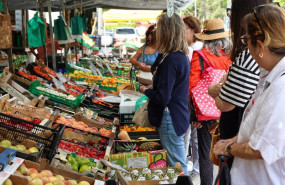 ep archivo   varias personas esperan en un mercado de la comunidad de madrid a 12 de junio de 2024