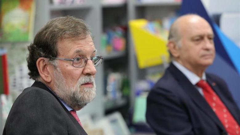 ep el expresidente del gobierno mariano rajoy i y el exministro de interior y miembro del pp jorge