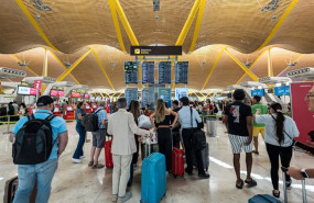ep archivo   pasajeros en el aeropuerto de madrid barajas a 19 de julio de 2024 en madrid espana