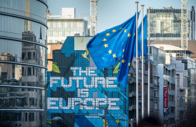 ep 29 january 2020 belgium brussels european flags wave near a mural painting with the inscription